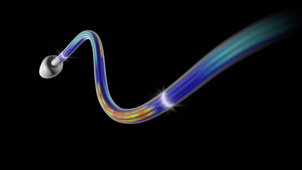 A colorful, flowing cable emits a spectrum of blue, yellow, and green hues against a black background. Resembling the elegant movement of cilia, it twists with a shining light accentuating its curves.