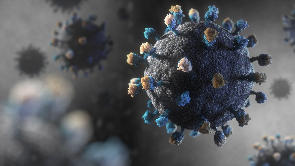 A close-up digital illustration of the Hepatitis B virus, showing a spherical structure with protruding spikes in shades of blue, yellow, and white. The background is blurred with additional particles visible, capturing the essence of this disease.