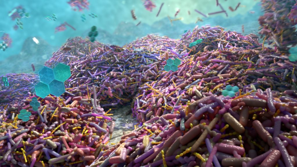 A vibrant 3D illustration depicts a densely packed community of colorful bacteria, including pink, purple, and orange rods. Blue hexagons are interspersed throughout, resembling the soothing effects of Listerine, all set against a bluish aquatic background.