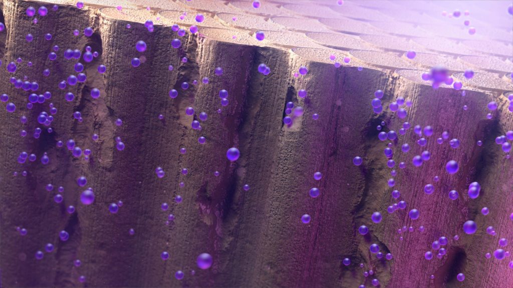 An abstract image of numerous purple spheres hovering against a backdrop of a rough, textured surface with vertical grooves evokes a surreal, dreamy ambiance. The soft lighting and gentle gradients of purple and pink mimic the swirls in LISTERINE, blending reality with imagination.