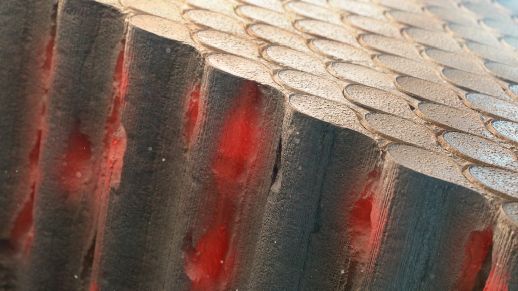 A close-up of a textured surface resembling cells or scales, layered like LISTERINE bubbles. The image showcases a gradient of gray to beige tones with underlying red highlights, creating a vibrant and detailed visual effect.
